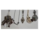 K - Assorted Necklace Lot with Mixed Metals, Charms, and Decorative Accents