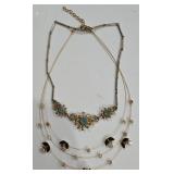 K - Assorted Necklace Lot with Mixed Metals, Charms, and Decorative Accents