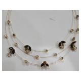 K - Assorted Necklace Lot with Mixed Metals, Charms, and Decorative Accents