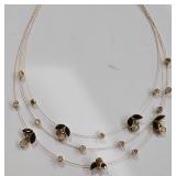 K - Assorted Necklace Lot with Mixed Metals, Charms, and Decorative Accents