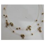 K - Assorted Necklace Lot with Mixed Metals, Charms, and Decorative Accents