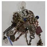 K - Assorted Necklace Lot with Mixed Metals, Charms, and Decorative Accents