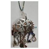 K - Assorted Necklace Lot with Mixed Metals, Charms, and Decorative Accents