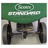 G - Scotts Broadcast Spreader and Black+Decker Leaf Blower with Extension Cord