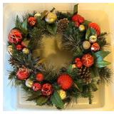 Decorative Holiday Wreath with Red and Gold Ornaments
