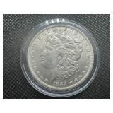 1884 O AU+ Morgan Dollar. Original Surfaces, Sigma Verified .90 Fine Pre 1900