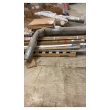 Pallet of Mixed Home Improvement Items including Curtain Rods, Flooring, Shelving, Moulding, and Projector Screen