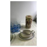 Kitchenware Collection with Blue Glasses, Flower Plates, Vintage Tins, and Gravy Boat