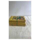 Set of 4 Little House Series Paperbacks by Laura Ingalls Wilder