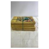 Set of 4 Little House Series Paperbacks by Laura Ingalls Wilder