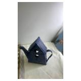 Decorative Wall Mirror with Ornate Frame and Blue Teapot-Shaped Birdhouse