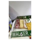 Group of Vintage Kitchen Towels, Decorative Street Signs, and Rotary Wall Clock