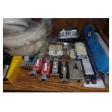Contents of Cabinet - Switches, Harris Torches, 3M Buffing Pads