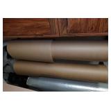 Paper and Sheeting Dispenser Rack with Rolls
