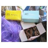 Variety of wigs, gift basket shrink...
