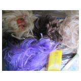 Variety of wigs, gift basket shrink...