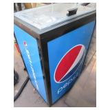 Near new Pepsi branded reach in ref...