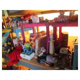 All toys and games pictured on shel...