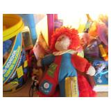 All toys and games pictured on shel...
