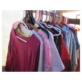 Variety of mostly adult size clothi...
