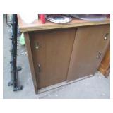 Wood sliding door cabinet. Approx 3...