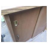 Wood sliding door cabinet. Approx 3...