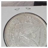 1889- Morgan AU  $1 Silver