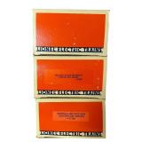 Lionel O Gauge Train Cars including Norfolk & Western Hopper, New York Central Flat Car with Stakes and Illinois Central Box Car