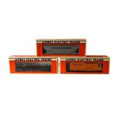 Lionel O Gauge Train Cars including Norfolk & Western Hopper, New York Central Flat Car with Stakes and Illinois Central Box Car