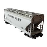 Lionel O Gauge Train Cars including Norfolk & Western Hopper, New York Central Flat Car with Stakes and Illinois Central Box Car