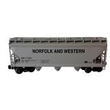 Lionel O Gauge Train Cars including Norfolk & Western Hopper, New York Central Flat Car with Stakes and Illinois Central Box Car