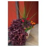 Large Beige Planter Containing a Variety of Colorful Foliage & Florals