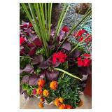 Large Beige Planter Containing a Variety of Colorful Foliage & Florals