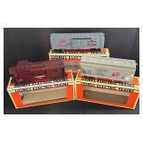 Three Lionel Electric Train Cars including Lionel Model 6-16264 Red Wing Shoes Box Car
