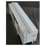 Three Lionel Electric Train Cars including Lionel Model 6-16264 Red Wing Shoes Box Car