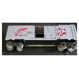 Three Lionel Electric Train Cars including Lionel Model 6-16264 Red Wing Shoes Box Car