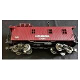 Three Lionel Electric Train Cars including Lionel Model 6-16264 Red Wing Shoes Box Car