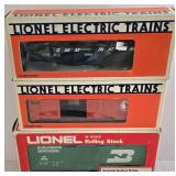 Three Electric Lionel Train Cars including Lionel Model 6-19401 Great Northern Gondola with Coal and More