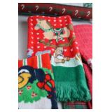 Holiday-themed towels and decorative pillow