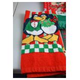 Holiday-themed towels and decorative pillow