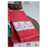 Holiday-themed towels and decorative pillow