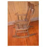 Vintage solid wood spindle-back rocking chair, 35 in. tall
