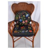 Wicker Armchair with Embroidered Floral Cushions