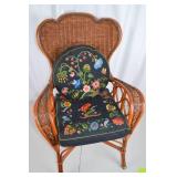 Wicker Armchair with Embroidered Floral Cushions