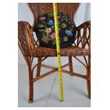 Wicker Armchair with Embroidered Floral Cushions