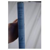 Vintage Books In A Basket.