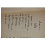 Vintage Books In A Basket.