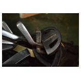 Cobra golf bag with assorted golf clubs