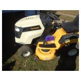 Cub Cadet LXT 1042KW mower. Kawasaki motor. 42 deck with bagger system. Used condition. Runs good. Tested & works. As shown. *THIS ITEM HAS A RESERVE.