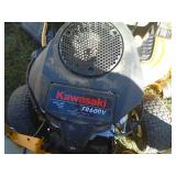 Cub Cadet LXT 1042KW mower. Kawasaki motor. 42 deck with bagger system. Used condition. Runs good. Tested & works. As shown. *THIS ITEM HAS A RESERVE.